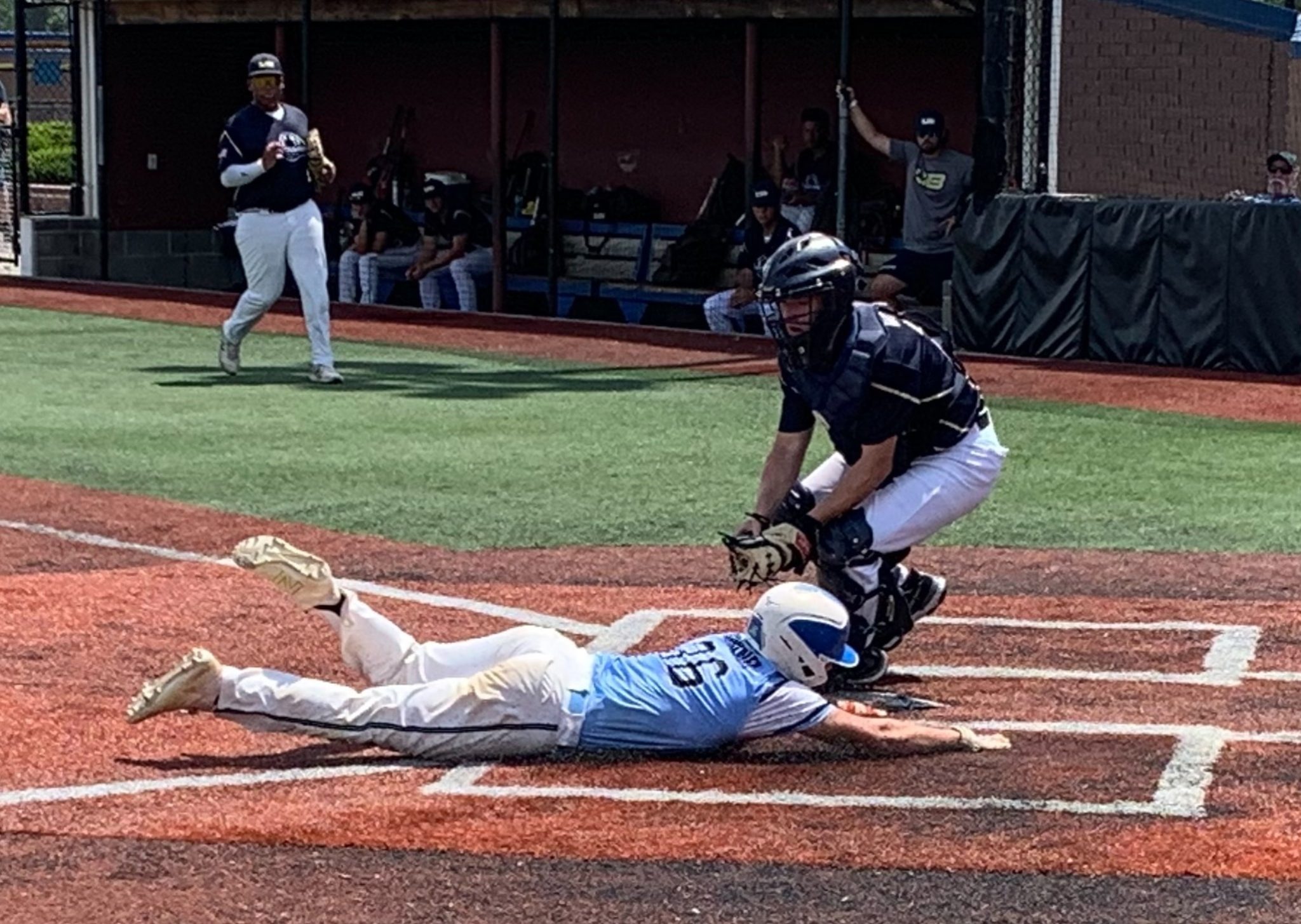 Catcher Gonzalez delivers at the plate for Young Guns Diamond Nation